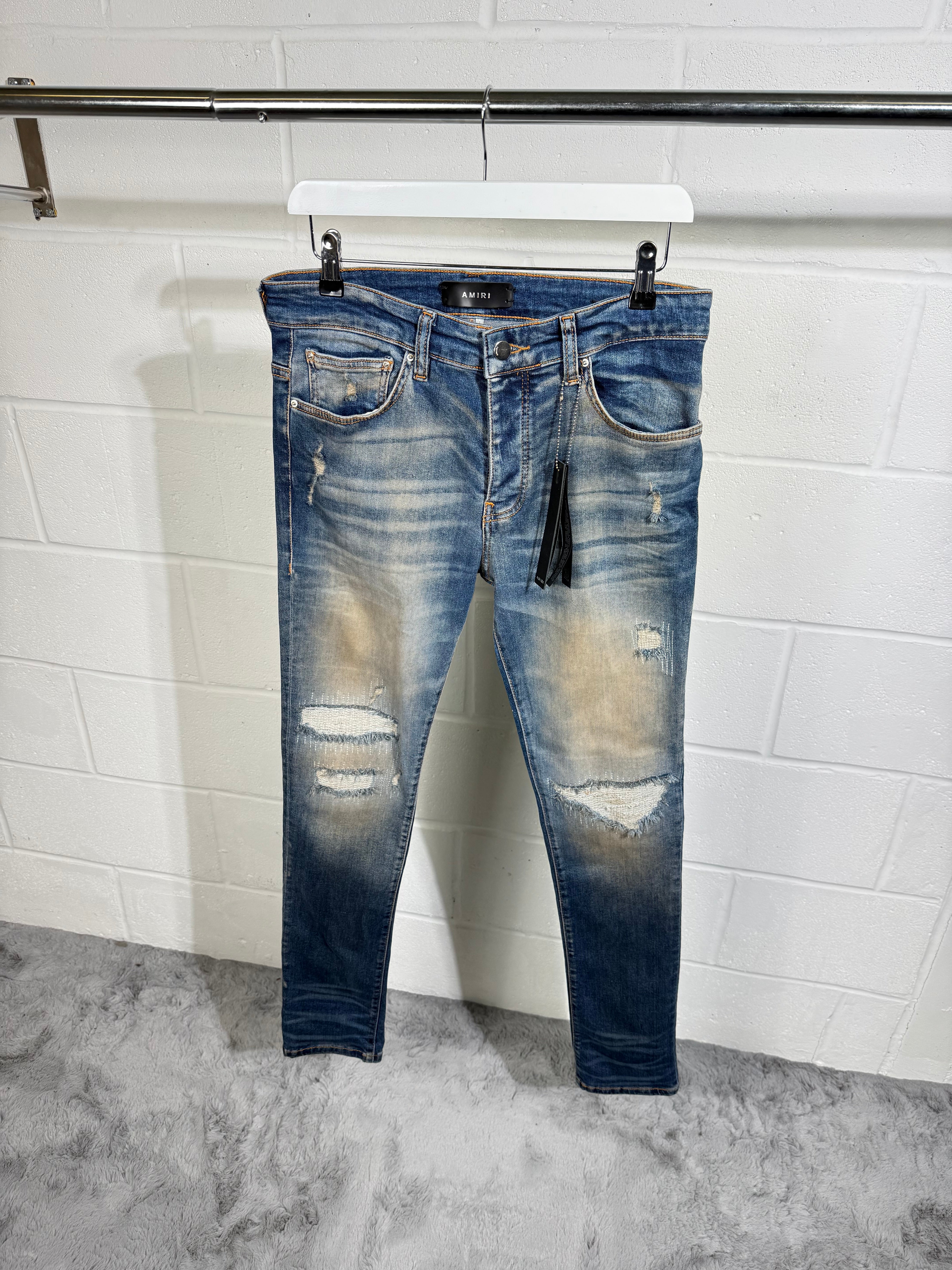 AMIR ripped jeans