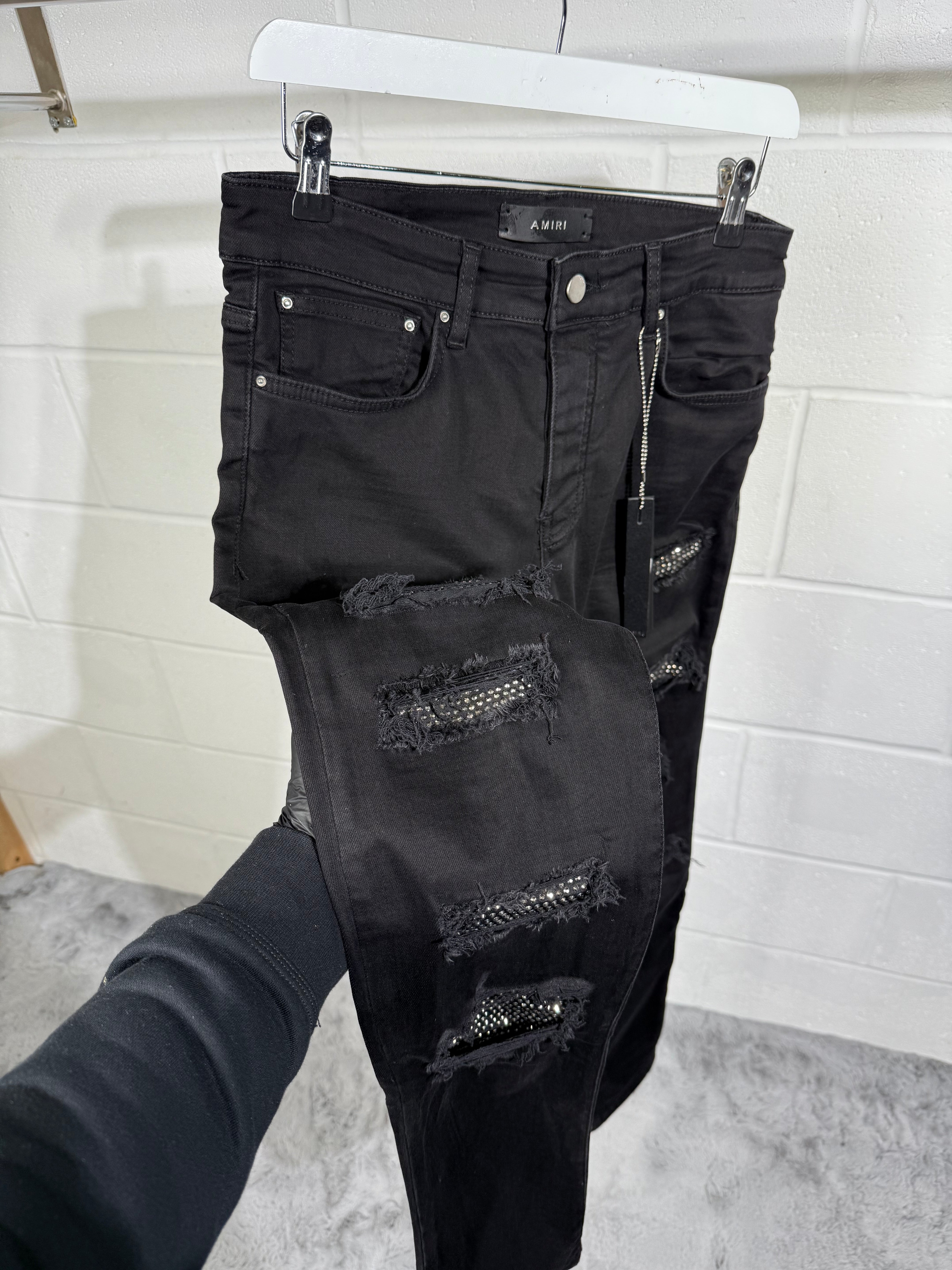 AMIRI RIPPED BLACK JEANS