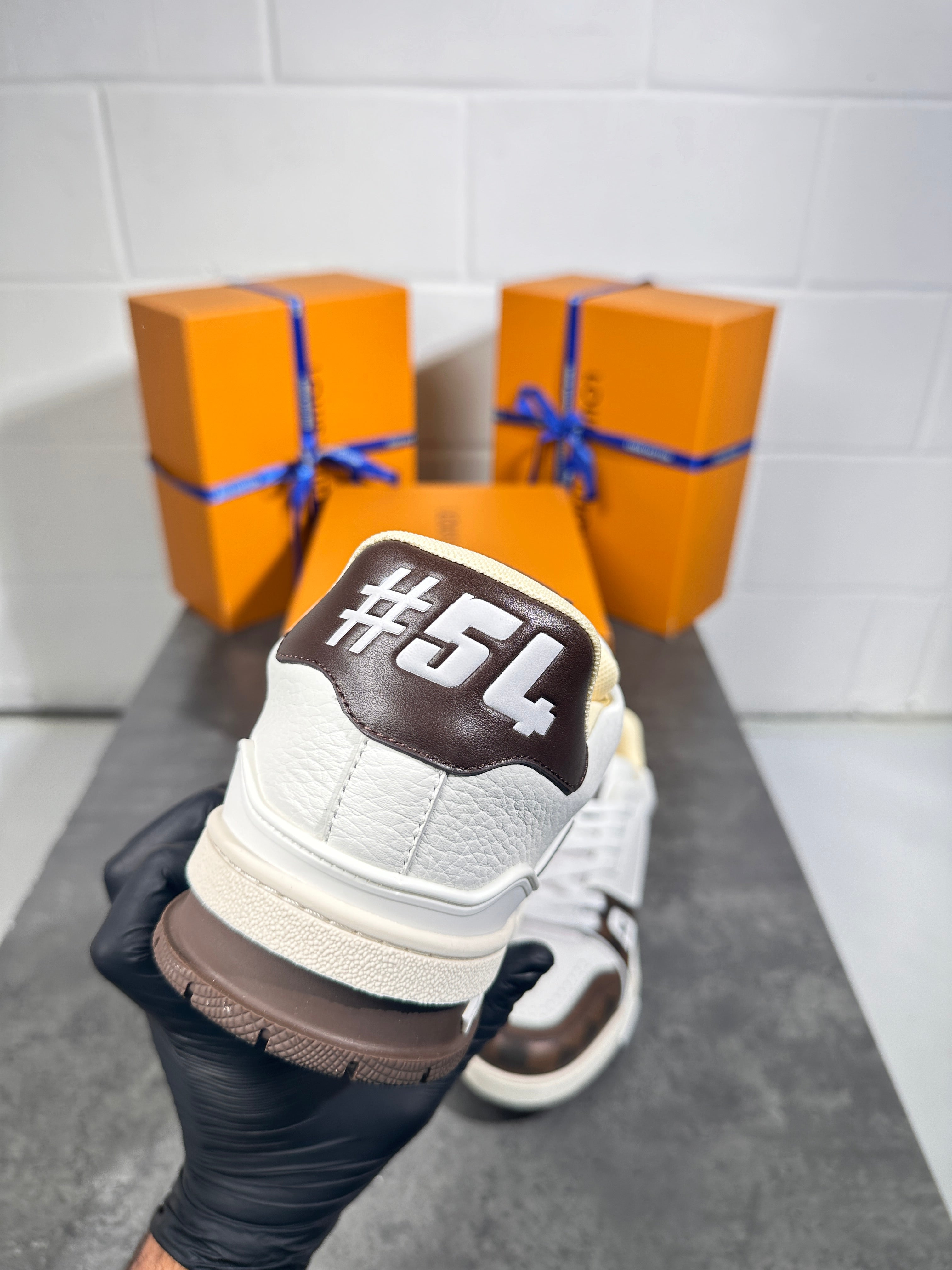 Lv trainers white n brown