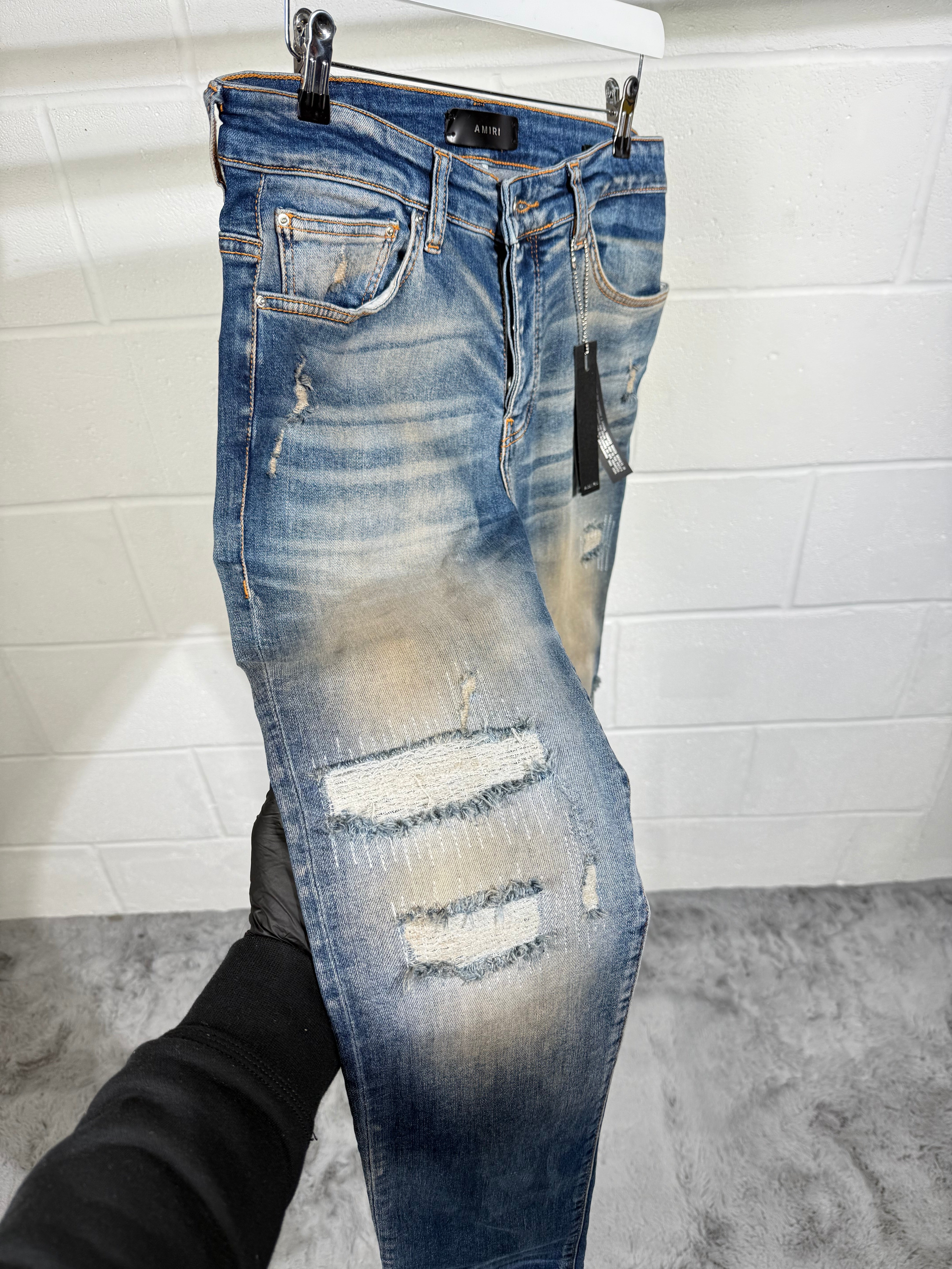 AMIR ripped jeans