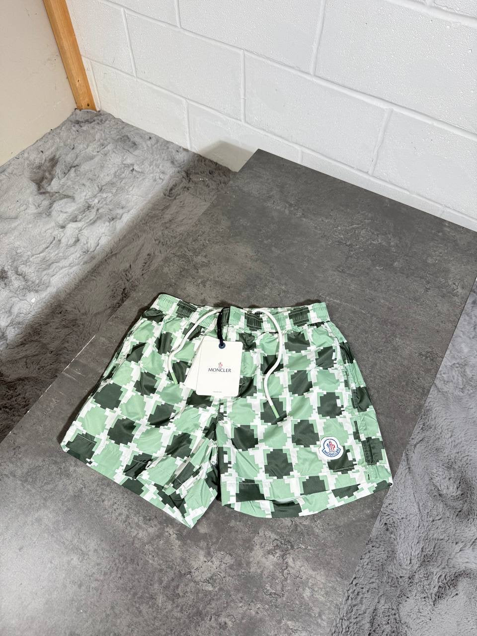 MNCLR SWIM SHORTS LOGO PRINT